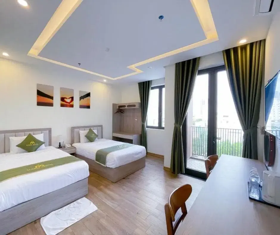 phong deluxe giuong doi 2 giuong don deluxe double or twin room 70bb630e