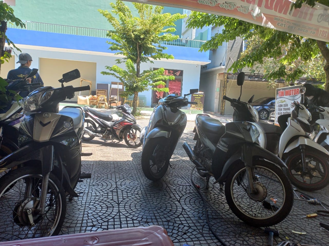 sua xe may tin motor